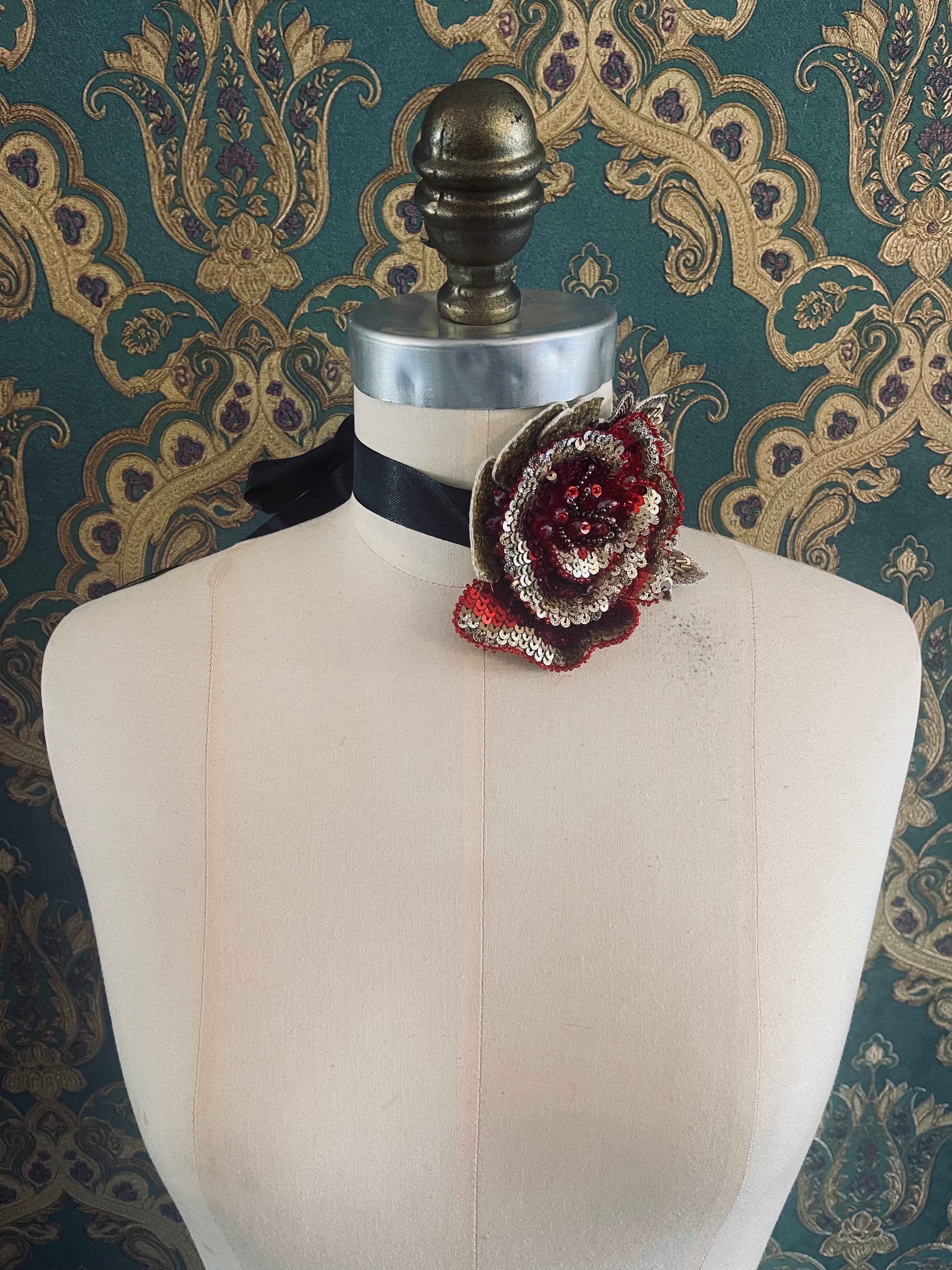 Broochella Girocollo Bejewelled flower choker brooch hand beaded sequin red gold men's women's designer luxury