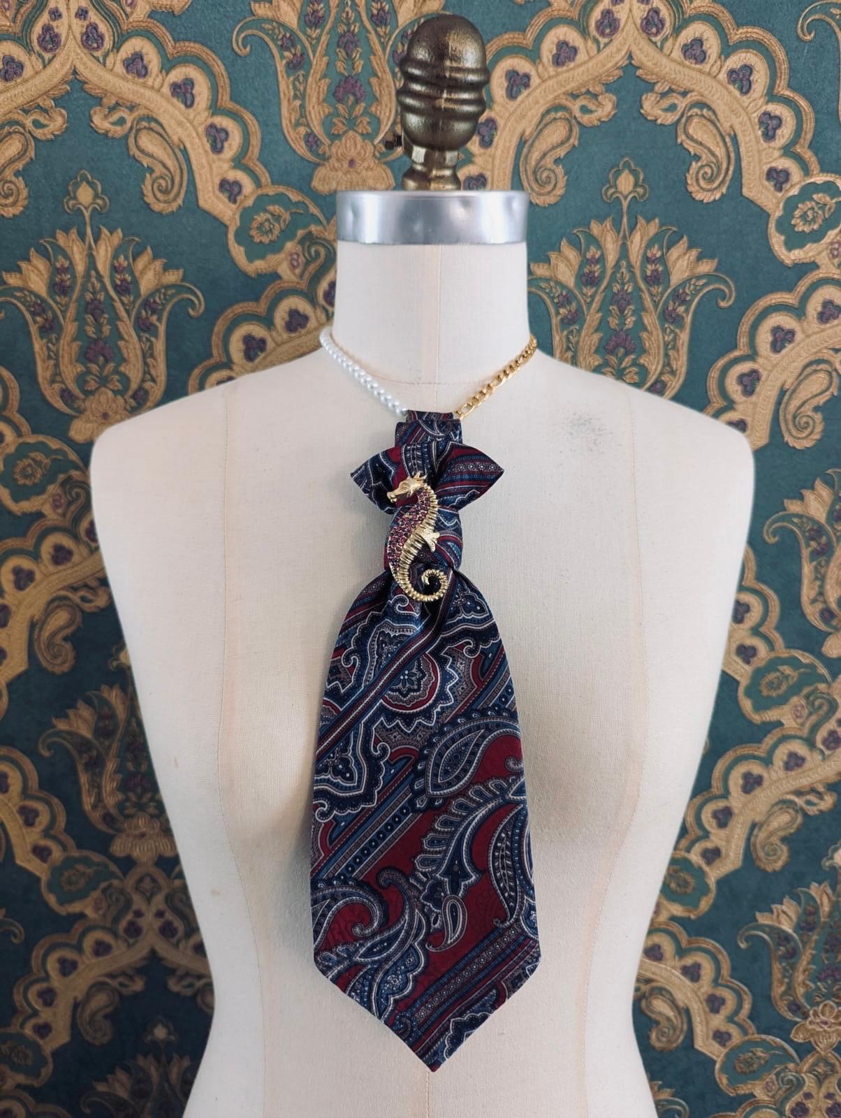 Broochella Montecristo Cravatta Tie brooch pin upcycled handmade vintage gold tone metal seahorse embellishment men's women's  designer luxury multicoloured red paisley print 
