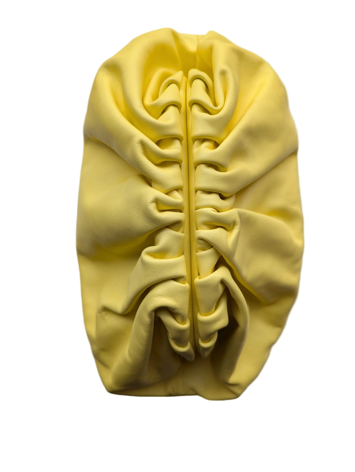 A Broochella Bottega Veneta The Pouch pale yellow large leather pouch clutch bag purse  with gathered pleats, placed on a white marble surface with gray veining.